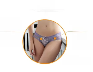 Detail view of lavender lace panties with ribbon bow and floral embroidery mesh