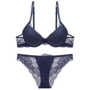 Navy blue lace lingerie set with push-up floral bra and matching semi-sheer panties