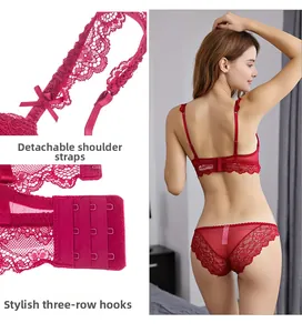 Detail of red lace bra with detachable straps and 3-row hook-and-eye back closure