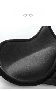 Macro detail of breathable black bra cup lining showing fine knitted fabric texture