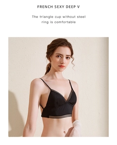 Detailed view of black French triangle bralette with mesh trim and wireless deep V design