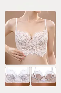 Macro detail of white floral eyelash lace longline bra with push-up support features