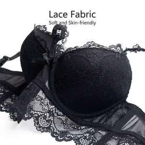 Elegant black lace push-up bra with floral embroidery and bow detail on white background