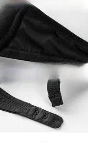 Detail view of black U-back bra showing molded cups and single row back closure