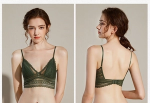 Close-up of dark green French lace bralette with triangle cups and delicate strap details