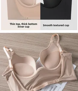 Close-up of seamless beige bra showing push-up padded cups and smooth fabric texture