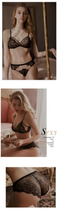Detailweergave van de zwarte wimperkant lingerieset met triangelcups en bloemenpatroon