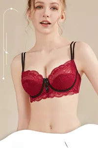 Close-up of red lace bra with soft wire and bow detail for a supportive and elegant fit