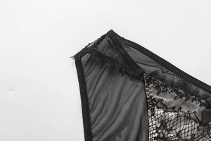 Close-up of black mesh panties featuring intricate floral lace and eyelash trim detailing