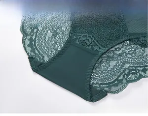 Close-up detail of dark green floral lace panties with double layer cotton crotch lining