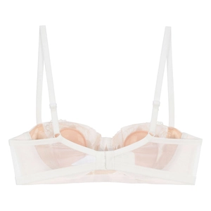 Detail of off-white lace bra featuring adjustable straps and double row back closure