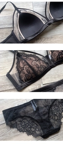 Detail van zwart wimperkant lingeriesetje met triangel bh en transparante kanten slip