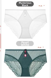 Detail of sheer lace panties with bow decor and cut-out in white and dark green