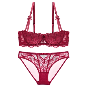 Elegant wine red lace lingerie set with floral vine pattern and bow details