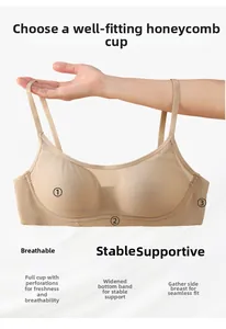 Breathable beige honeycomb mesh bra with wide support band and seamless design details