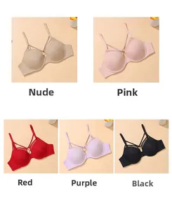 Detail of seamless bras in five colors featuring slim criss-cross shoulder straps