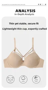 Macro detail of nude soft-wire bra featuring sheer mesh panels and cross-strap design