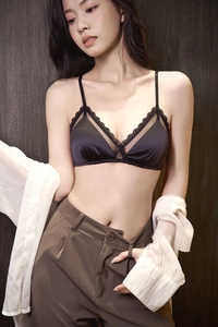 Detailed view of black satin lace triangle bra with fine scalloped floral edging