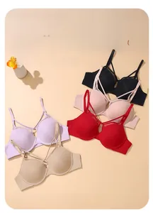 Detailed pile of multi-color traceless bras showing soft seamless fabric and cross straps