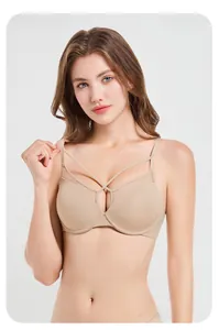 Detail view of nude seamless bra with mesh拼接 and criss-cross straps for soft support