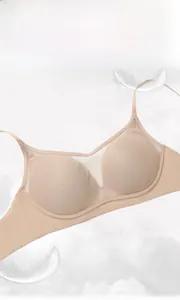 Detail of nude seamless bralette with mesh trim and thin straps for lightweight comfort
