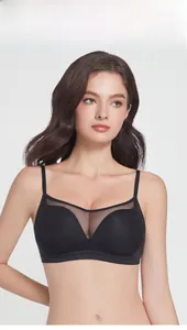 Close-up of black seamless bra with mesh paneling and delicate thin shoulder straps