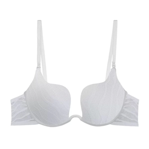Detail of white deep U-plunge seamless bra with breathable ribbed texture and straps