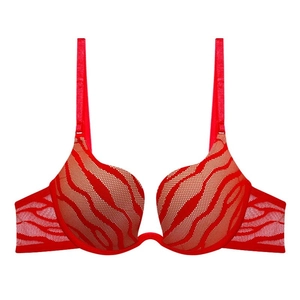 Close-up of red wave mesh fabric and U-shaped deep V cut design on a lady's bra