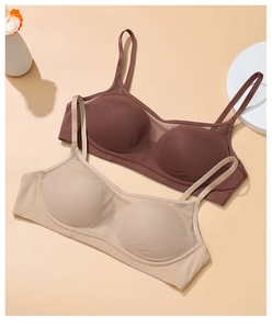 Detail of seamless lace mesh bras in coffee and beige with thin shoulder straps