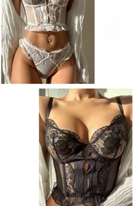 Close-up of intricate floral lace embroidery and sheer mesh on a sexy corset lingerie