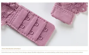 Detailed close-up of the three-row hook and eye closure on a lavender lace bra