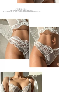 Detail view of white lace lingerie set with floral patterns and sheer mesh fabric