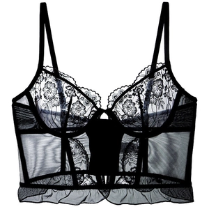 Detailed view of black lace corset bra with floral embroidery and mesh frill hem