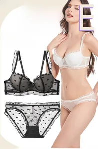 Detail shot of the 1/2 cup lace bra featuring heart print mesh and ruffled trim textures