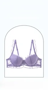 Detailed macro of purple lace bra cup featuring heart-shaped jacquard and ruffled straps