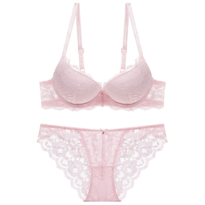 Delicate light pink lace lingerie set with push-up bra and matching floral panty