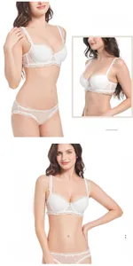 Close-up detail of white lace lingerie set with heart dot mesh and ruffled straps