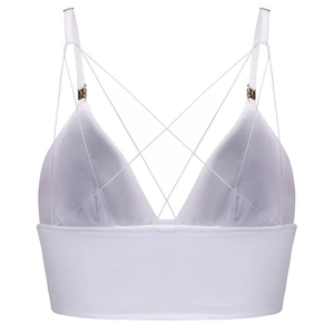 Detail of white triangle bralette with criss-cross straps and gold hardware adjustment