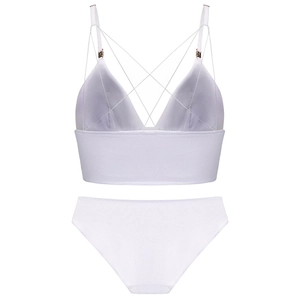 Detail of white French-style triangle bralette with criss-cross back straps and metal buckles