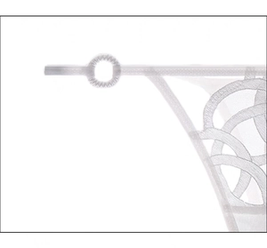 Detail shot of white lace embroidery and ring connector on sheer thong underwear