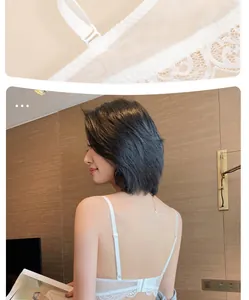 Détail de la broderie en dentelle française et bretelle arrière réglable sur un soutien-gorge blanc