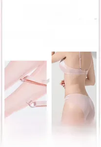 Close-up of pink lace lingerie set showing high-elastic straps and back buckle detail