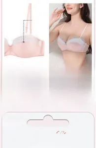 Detailed close-up of the pink lace bra cups with delicate scalloped white edges