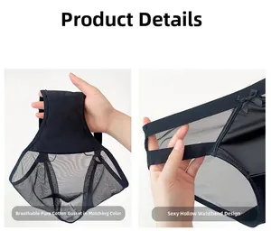 Detail view of black sheer mesh panties featuring a waist cutout and a delicate bow decor