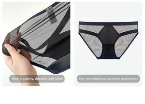 Detail of black seamless lace panties showing high-stretch mesh fabric and bow ornament