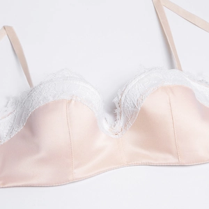 Champagne pink satin and white lace bra with slim straps for a minimalist look