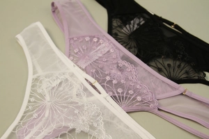Three-pack set of lace embroidery panties in white, lilac and black with metal buckles