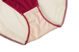 Close-up of seamless mesh fabric with high-quality stitching and breathable cotton crotch