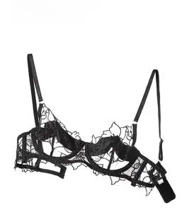 Close-up of black floral lace embroidery detail on ultra-thin sheer mesh bra