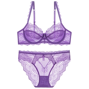 Lace lingerie set in purple featuring sheer floral bra and matching briefs on white backdrop